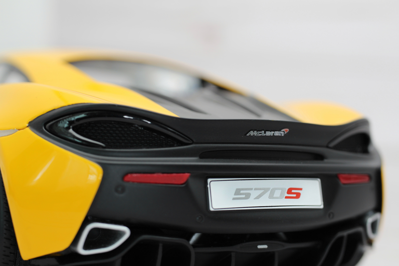 Illustration for article titled TopSpeed's Volcano Yellow McLaren 570s